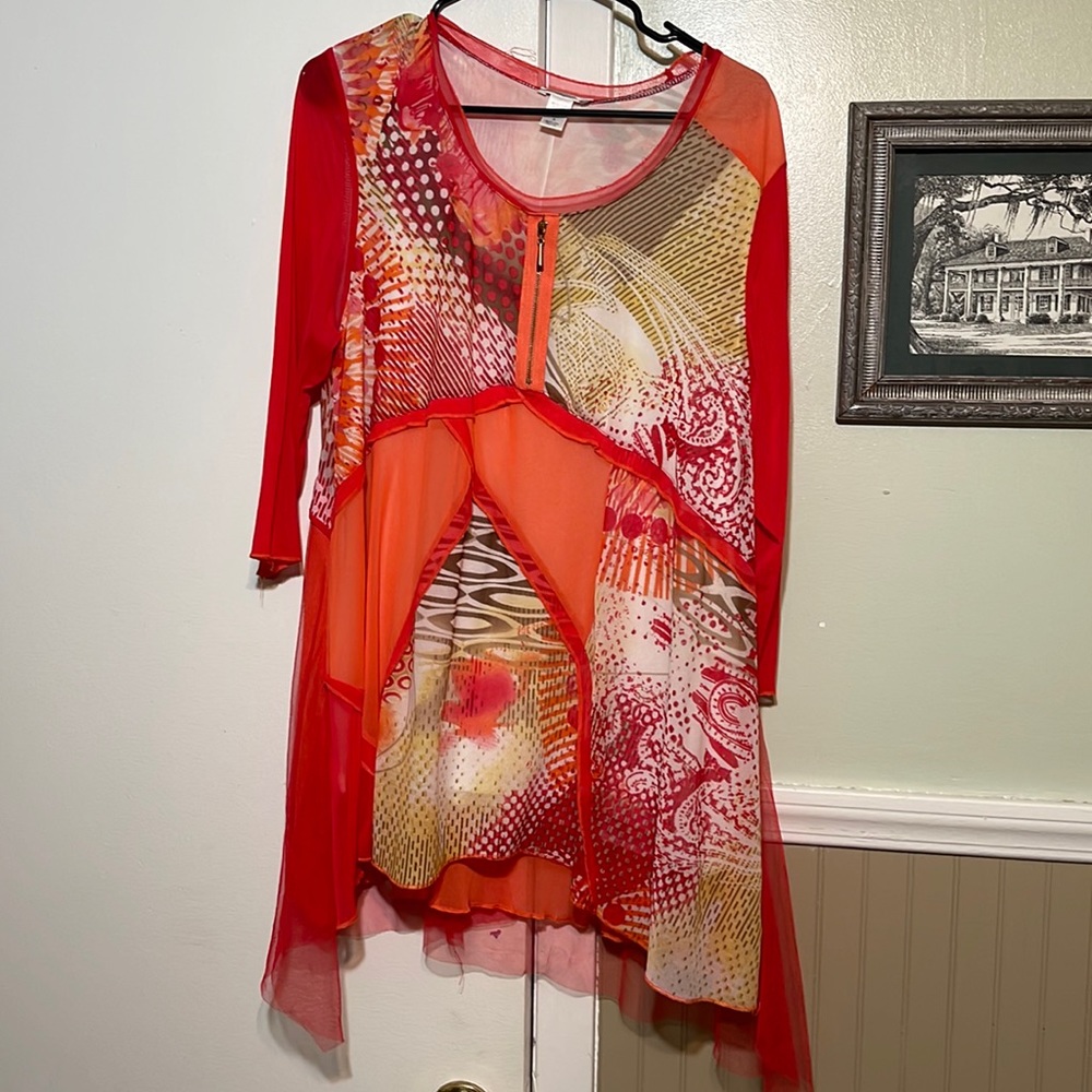 Long flowy shirt would look cute with leggings and boots
